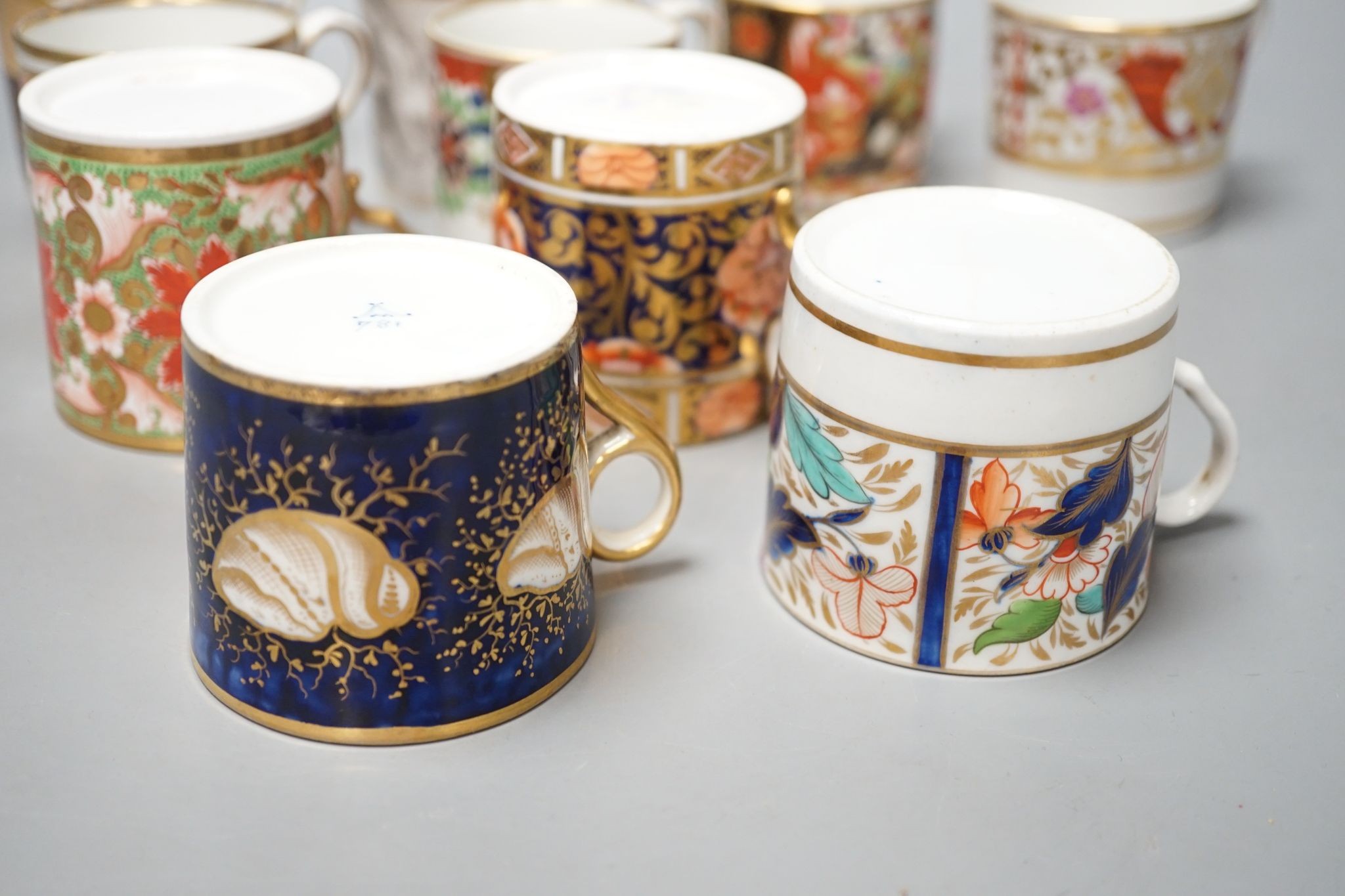 Ten various early 19th century English porcelain coffee cans